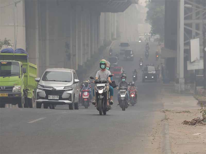 Palembang Diselimuti Asap Karhutla, Jarak Pandang Turun 400 Meter